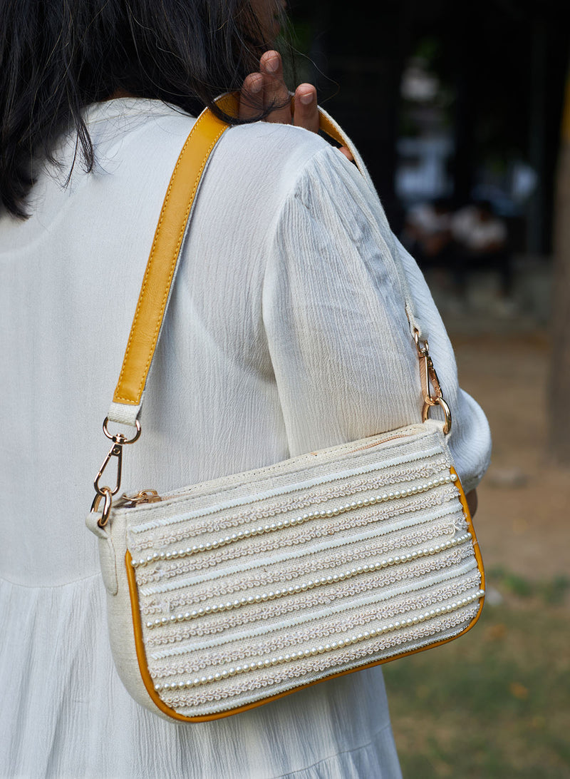Pearls and laces baguette bag