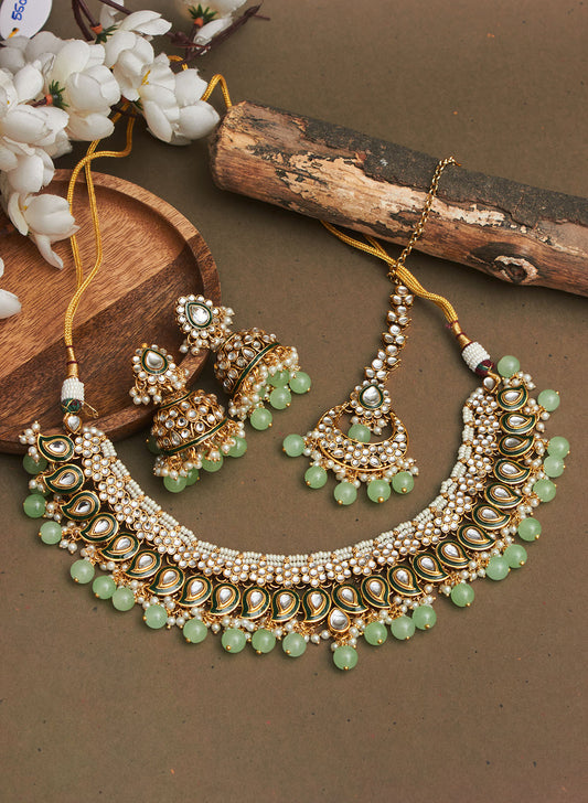Enakshmi stone choker set with maangtika