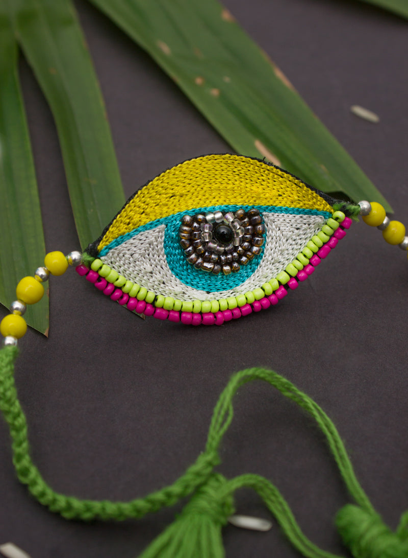 yellow evil eye rakhi