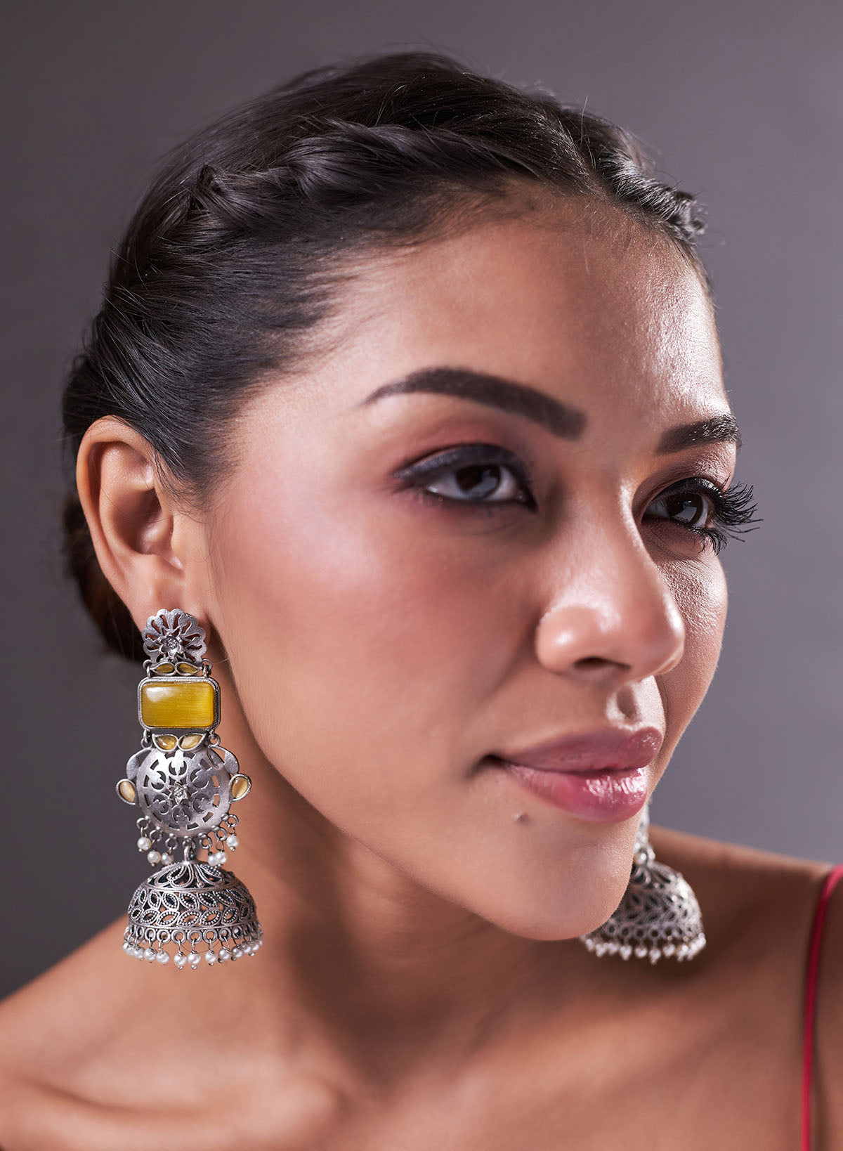Pravina stone jhumka